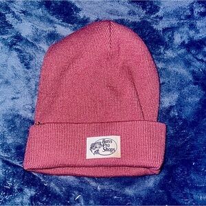 New Bass Pro Shops Raspberry colored Cozy Beanie with label on the front
